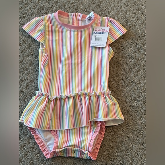 Ruffle Butts Other - ✨HP✨ NWT RuffleButts Rainbow Stripe Peplum Swimsuit 3T